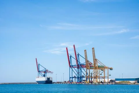 Gantry cranes background with copy space. Seascape of dock Stock Photos
