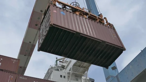 Gantry cranes container transferred from ship to terminal 4k Stock Footage 108985923