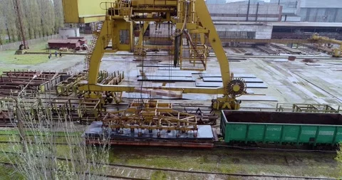 Gantry electromagnetic crane. Electromagnetic crane on steel yard Stock Footage 319291247
