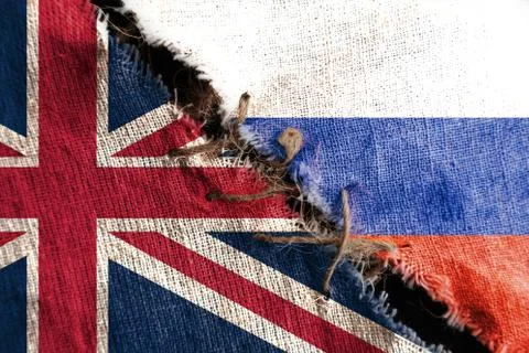 The gap between the two flags, Russia  and Great Britain, as a concept of pol Stock Photos