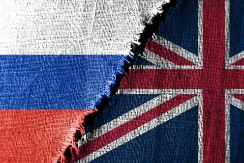 The gap between the two flags, Russia  and Great Britain, as a concept of pol Stock Photos