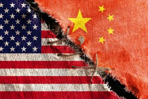 The gap between the two flags of the United States and China, sewn with threa Stock Photos