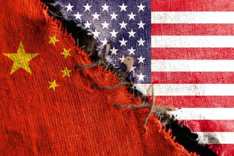 The gap between the two flags of the United States and China, sewn with threa Stock Photos