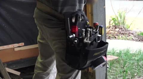 Garage door replacement, large tool belt Stock Footage 45514354