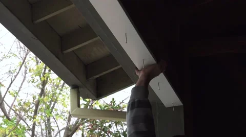 Garage door replacement, nailing trim overhead Stock Footage 45514342