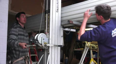 Garage door replacement, old door Stock Footage 45514437
