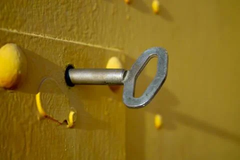 Garage key in the lock Stock Photos