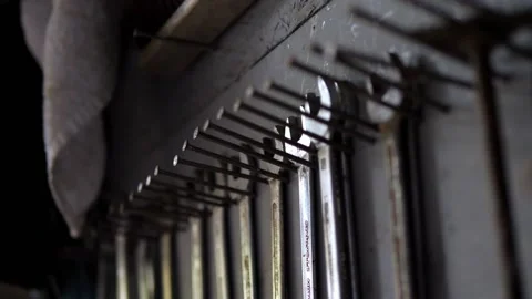 Garage Tools end wrenches rack focus low angle Stock Footage 195999557