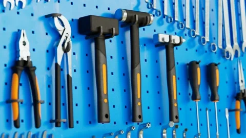 Garage tools hanging on the organizer wall. Loopable animation. Workshop. 4K HD Video stock 133458662