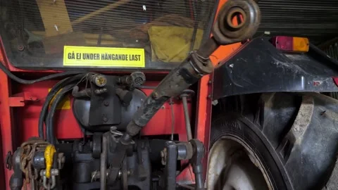 Garage Tools rotating pan right back of tractor Stock Footage 195999356