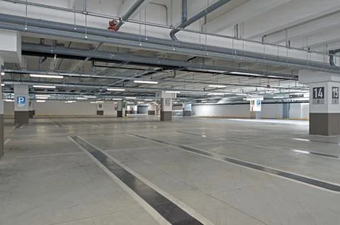 Garage, underground interior with empty parking lot of a superm Stock Photos