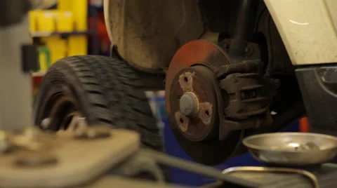 Garage: wheel change Stock Footage 59830153
