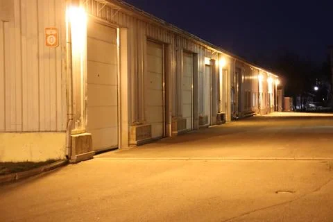 Garages with lights at night Stock Photos