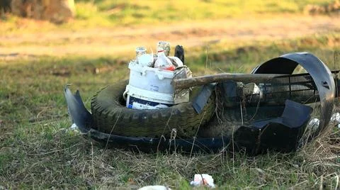 Garbage abandoned in a suburban clearing Foto stock