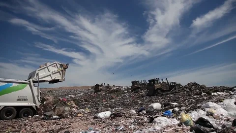 Garbage accumulated by trucks Stock Footage 77698535
