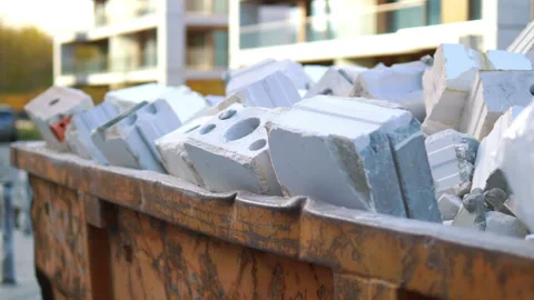 Garbage and debris container in 4k slow motion 60fps Stock Footage 164547497