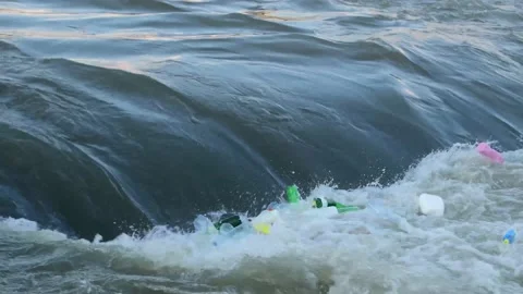 Garbage and plastic bottles in the water Stock Footage 163115120