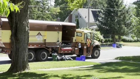 Garbage and recycling being picked up Stock Footage 277976810