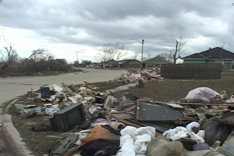 Garbage and refuse is scattered around a neighborhood following Hurricane Stockbeeldmateriaal 338516