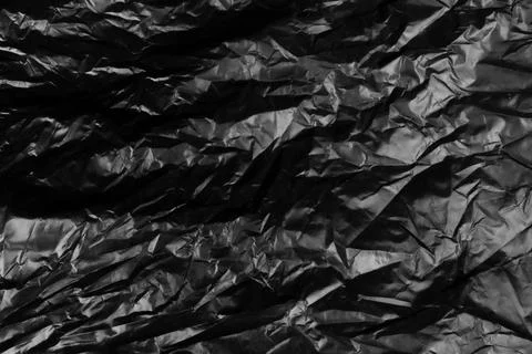 Garbage bag is crumpled dark black Stock Photos