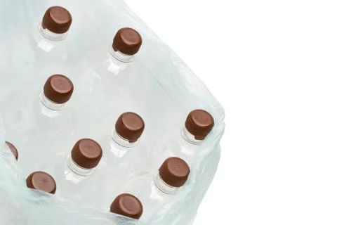 Garbage bag with empty transparent plastic bottles Stock Photos