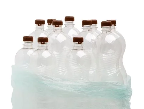 Garbage bag with empty transparent plastic bottles Stock Photos