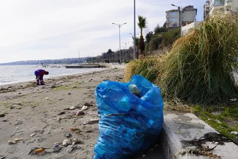 Garbage Bags On The Beach 3 Stock Photos
