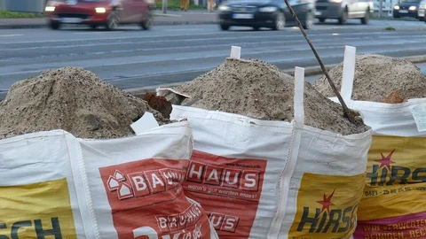 Garbage bags filled with rubble standing on the street, Germany, Europe Video stock 122989382