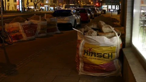 Garbage bags filled with rubble standing on the street, Germany, Europe Stock Footage 122989383