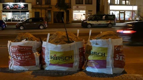 Garbage bags filled with rubble standing on the street, Germany, Europe Stock Footage 122989392