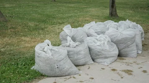 Garbage bags stack on a park 動画素材 278381902