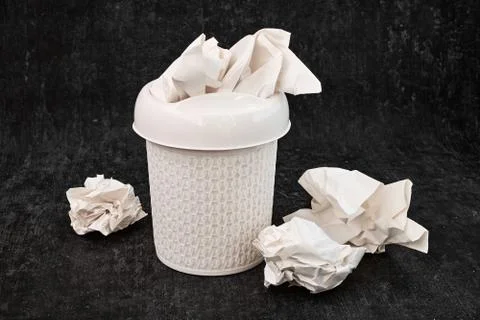 Garbage basket on gray background, close up, shallow depth of sharpness Stock Photos