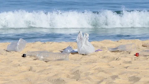 Garbage at the beach hurting the beautiful environment Stock-Footage 108911091