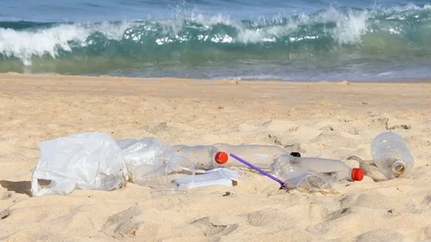 Garbage at the beach hurting the beautiful environment Stock-Footage 109102936
