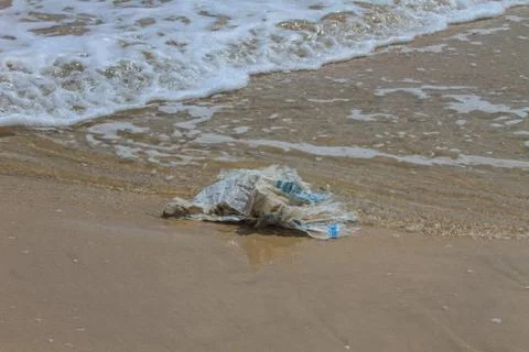 Garbage on a beach Stock Photos
