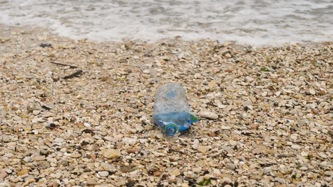 Garbage at beach: Plastic bottle Stock Footage 86192715