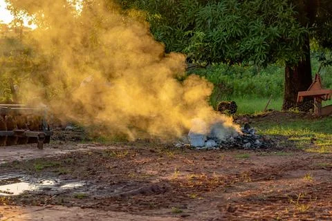 Garbage being burned on a farm Stock Photos