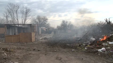 Garbage being burning on a dump Stock Footage 139283751