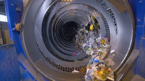 Garbage being sorted at waste processing plant. Stock Footage 76356867