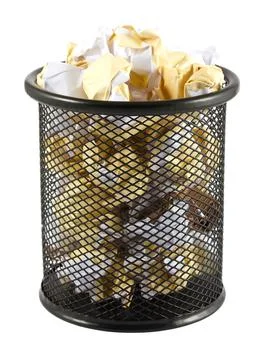 Garbage bin with crumpled paper Stock Photos