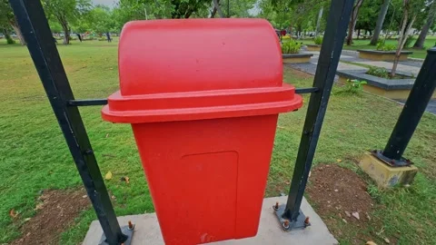 Garbage Bin Installation in Public Park Orbiting Camera Shot Stock Footage 338035037