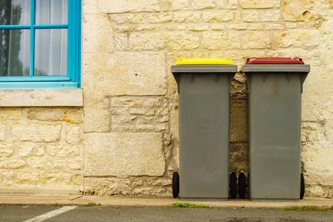 Garbage bin or trash can outdoors Stock Photos