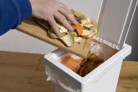 The garbage into the bin Stock Photos
