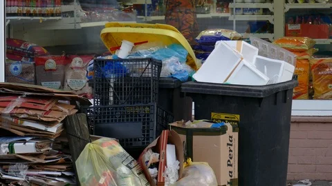 Garbage bins, boxes, old cardboard, yellow bags for plastic waste, yellow bin Stock Footage 122271354