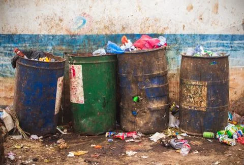 Garbage Bins Full of Garbage Stock Photos