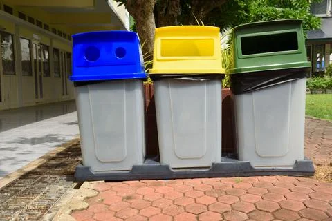 Garbage bins separated by colors Stock Photos