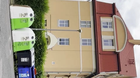 Garbage bins for sorting garbage in a European city. The problem of garbage in Stock Footage 250112721