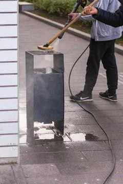Garbage bins in the yard. Stock Photos