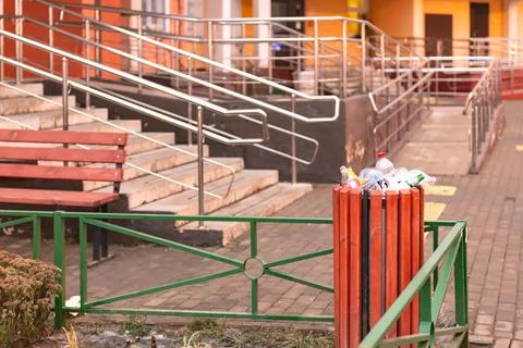 Garbage bins in the yard. Stock Photos