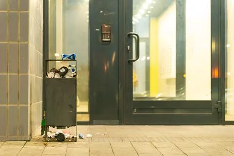 Garbage bins in the yard. Stock Photos